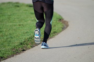 Image of a person jogging on a path