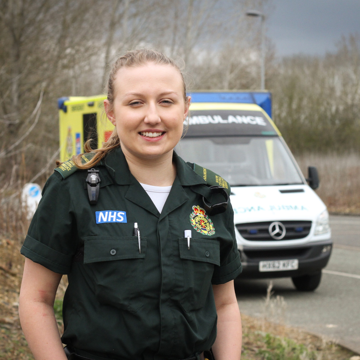 SCAS Paramedic standing in front of an ambulance