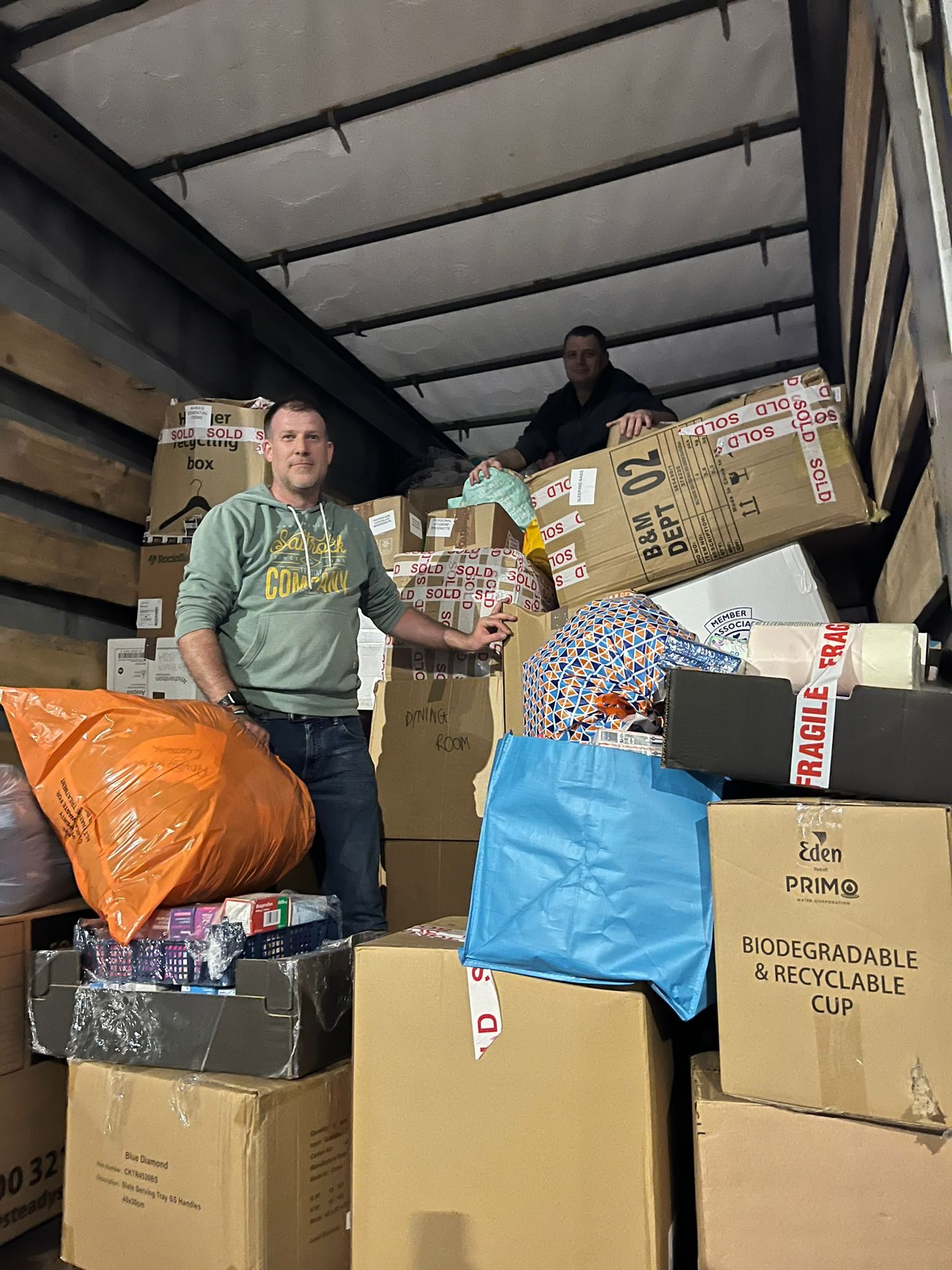 Operations Manager, David Hamer, helps load the first HGV to be sent to help Ukrainians affected by the conflict