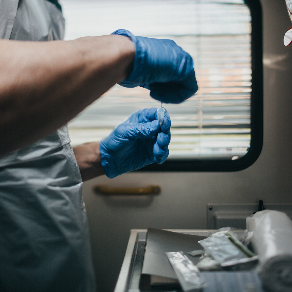 SCAS paramedic wearing gloves