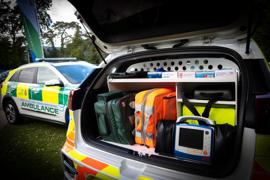 Car boot open and full of emergency medical equipment