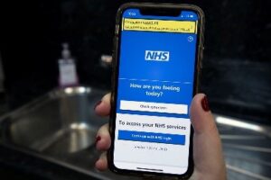 Mobile Phone Showing NHS App on Screen
