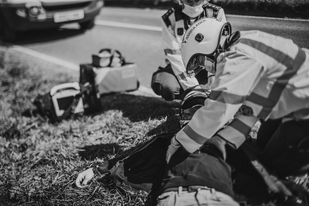 Motorbike accident patient being examined