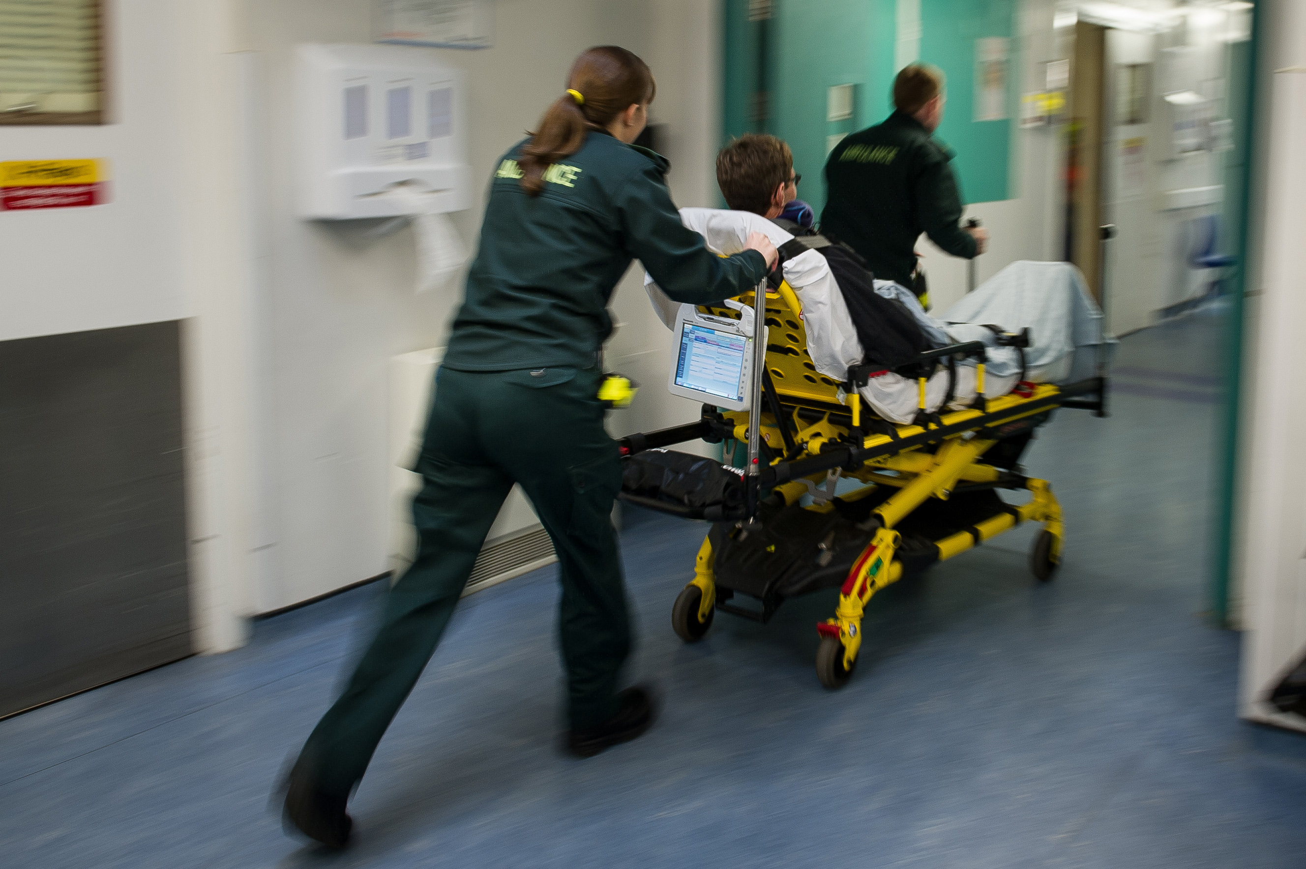Paramedics in hospital with patient