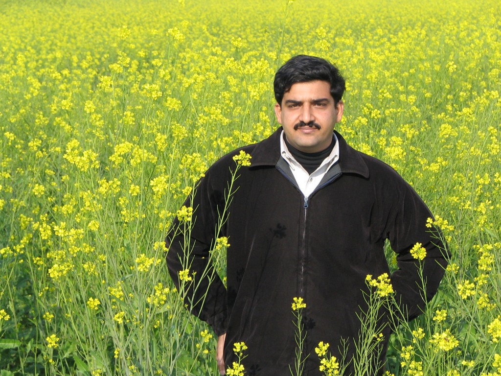 Asian man in field