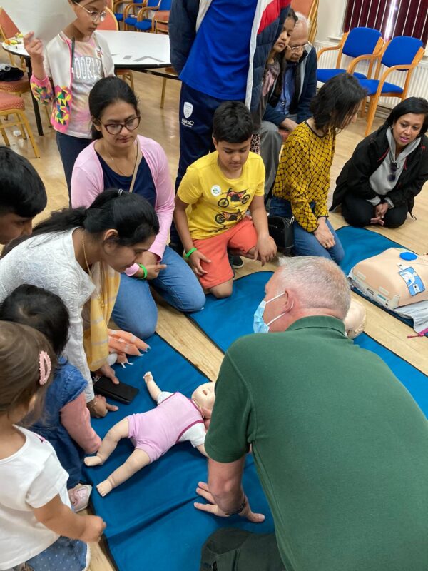 SCAS colleagues teaching the public CPR