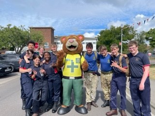 HMS Collingwood Event July 22 (15) SCAS mascot 999 Ted standing with public