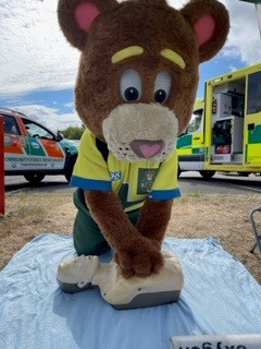 HMS Collingwood Event July 22 (22) SCAS mascot 999 Ted practicing CPR