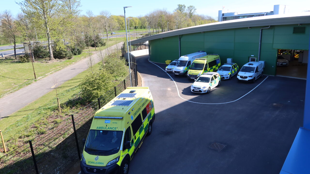 Ambulance vehicles parked outside Milton Keynes Blue Light Hub