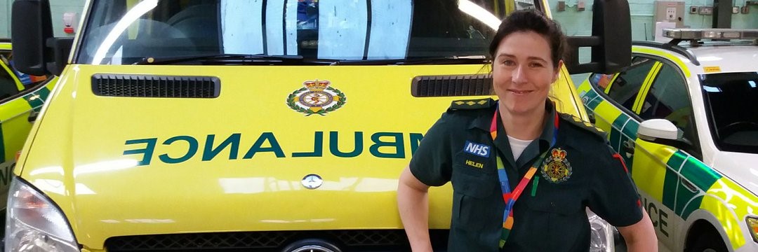 paramedic in front of an ambulance