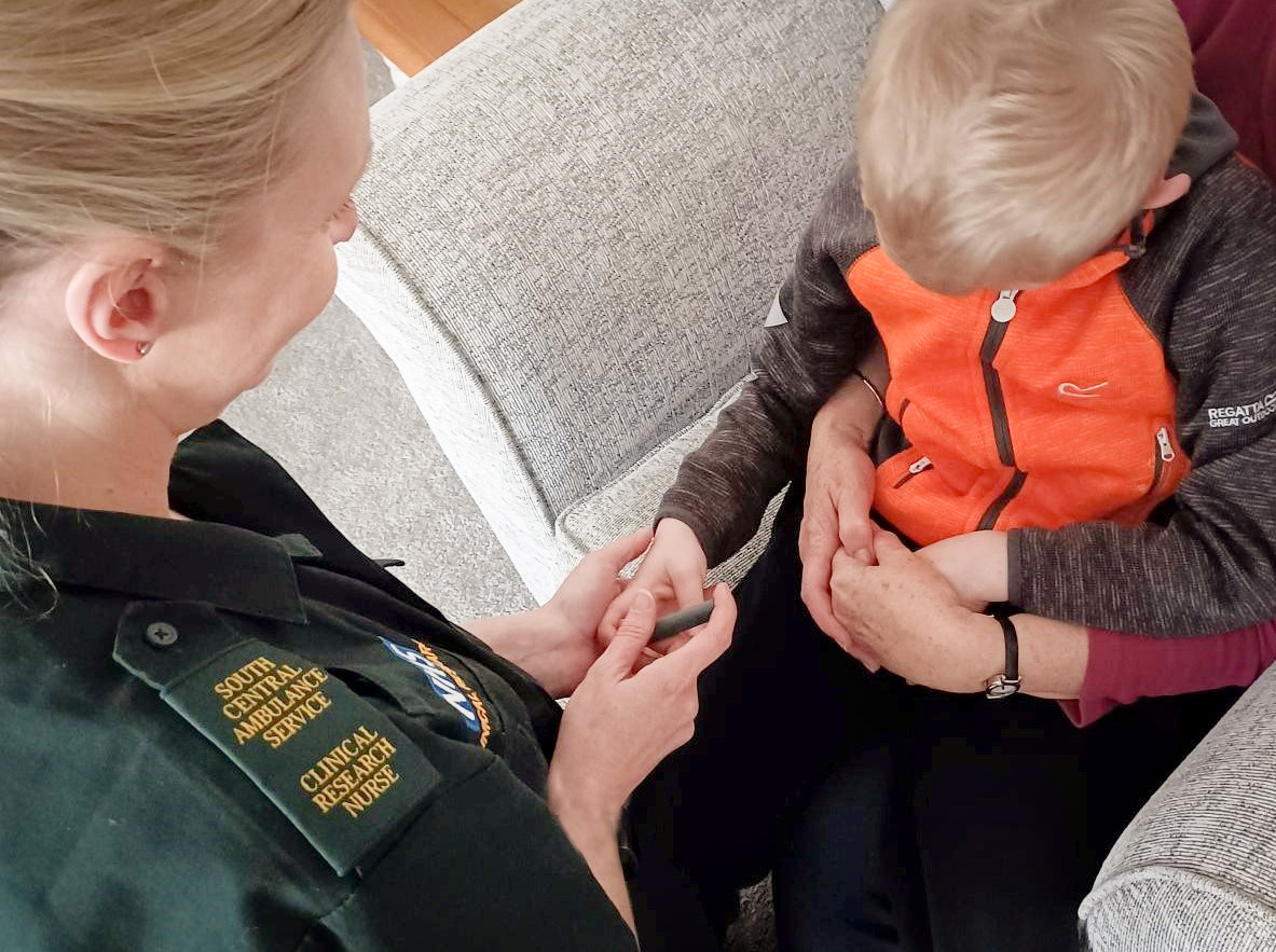 Diabetes screening study - research paramedic with child
