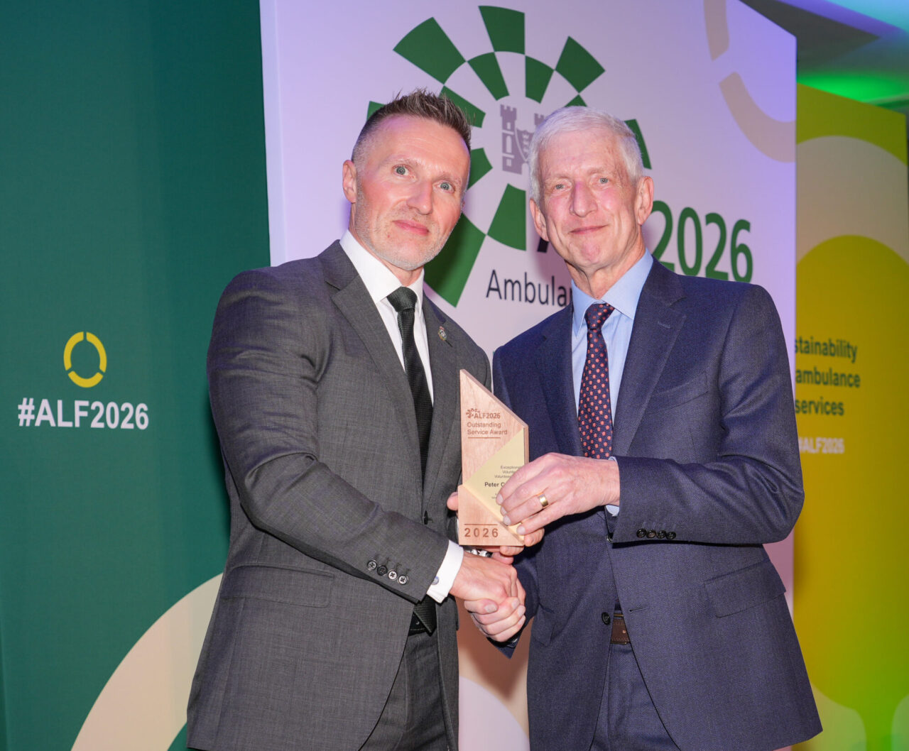 SCAS Community First Responder accepting award for Exceptional Volunteer at national event.