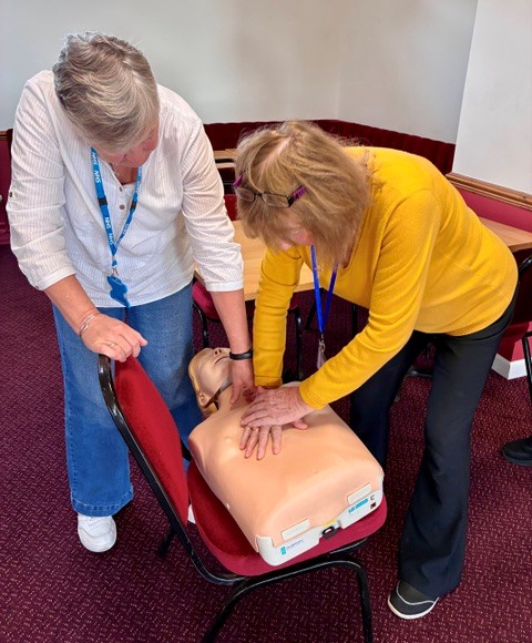 Lynn Dove-Dixon, Public Governor, Hampshire, demonstrates CPR
